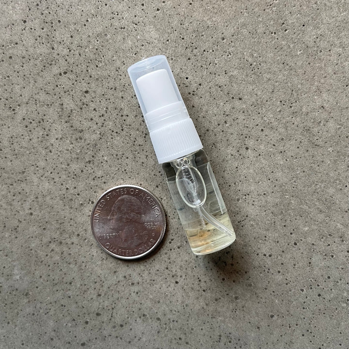 A bottle of dupe sample size of a coin.