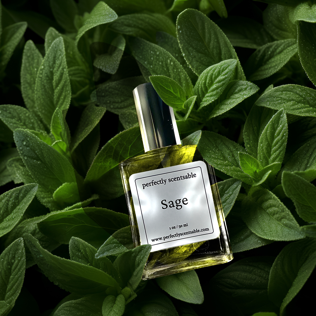 Perfectly Scentsable Sage perfume oil — square glass bottle with silver cap nestled among fresh green sage leaves