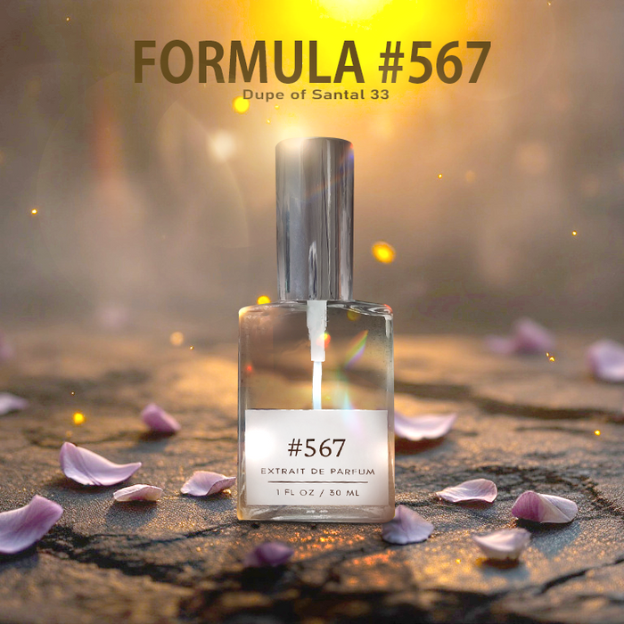 Formula #567 — dupe of Santal 33 — extrait de parfum bottle with silver cap on sunlit stone, scattered pink petals and warm bokeh glow