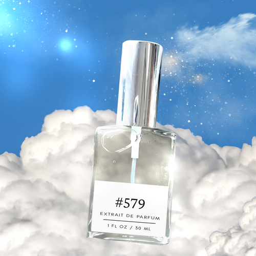 Perfectly Scentsable #579 extrait de parfum — clear 1 fl oz bottle with silver cap floating above fluffy white clouds against a bright blue sky