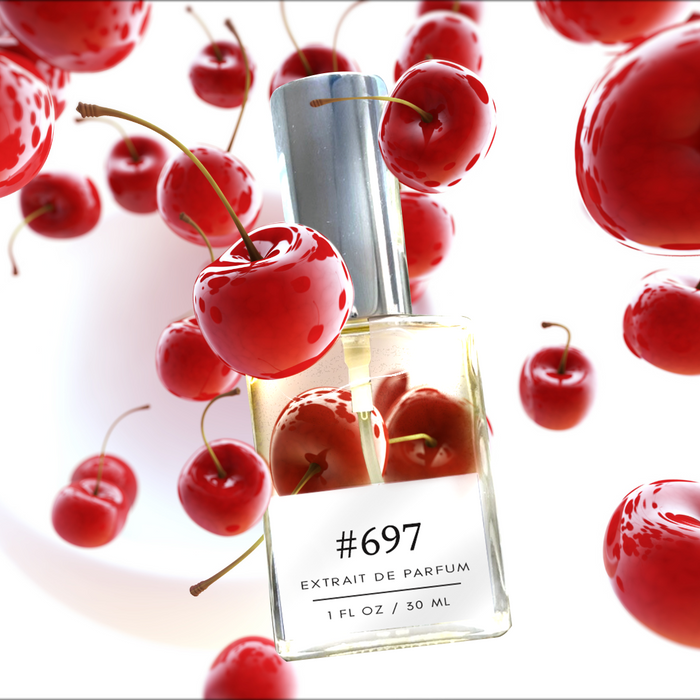 Formula #697 extrait de parfum bottle (1 fl oz / 30 ml) surrounded by glossy red cherries on a bright white background