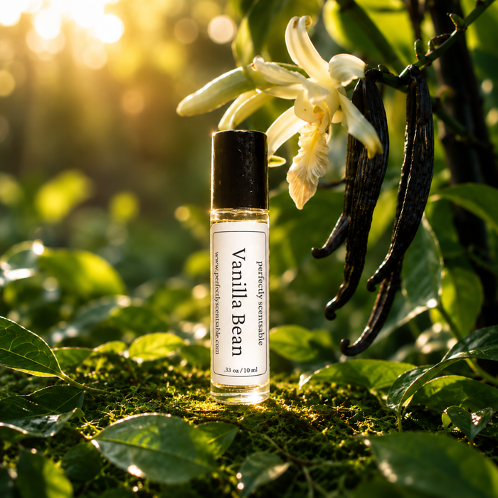 Vanilla Bean roll-on perfume bottle displayed on lush green moss, surrounded by glossy leaves, vanilla flowers, and dark vanilla pods, with warm golden sunlight glowing through the background.