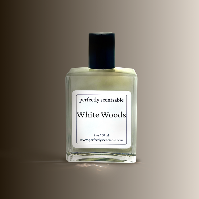 Perfectly Scentsable White Woods perfume oil — 2 oz (60 ml) clear glass bottle on a soft taupe gradient background