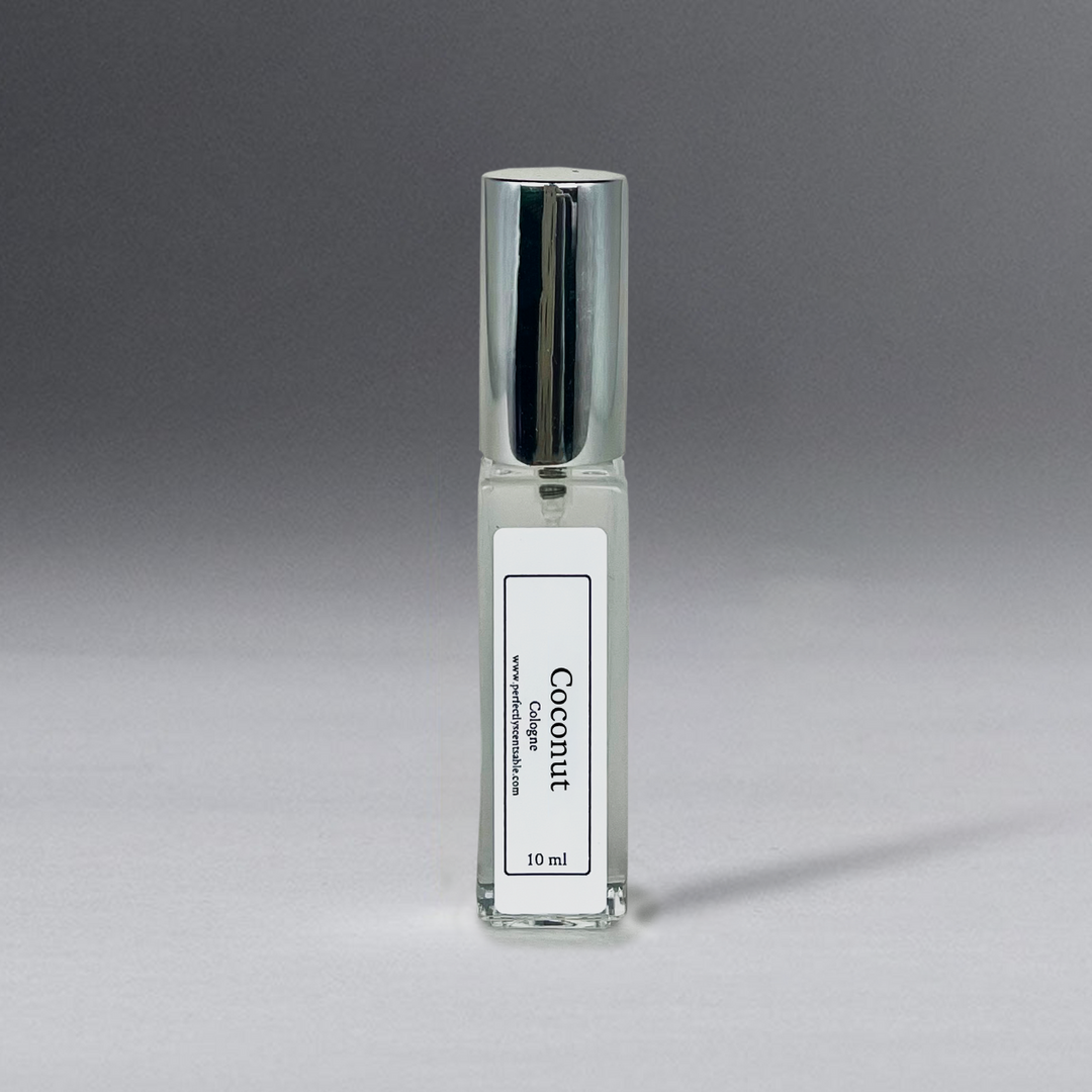 Clear 10 ml oil bottle in a rectangular shape with a silver cap, elegantly standing against a gray background.