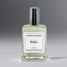 Load image into Gallery viewer, Clear 1 oz oil bottle with silver cap standing against a gray background.
