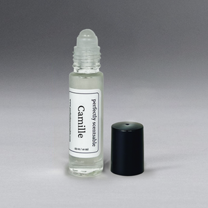 Clear 0.33 oz roller bottle without lid, set against a gray background, standing upright.