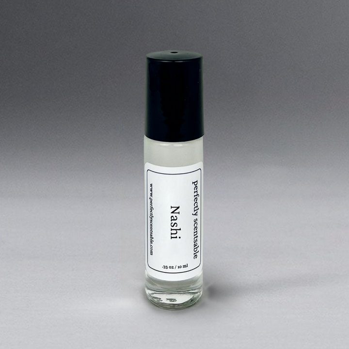 Clear 0.33 oz roller bottle with lid, elegantly standing against a gray background.