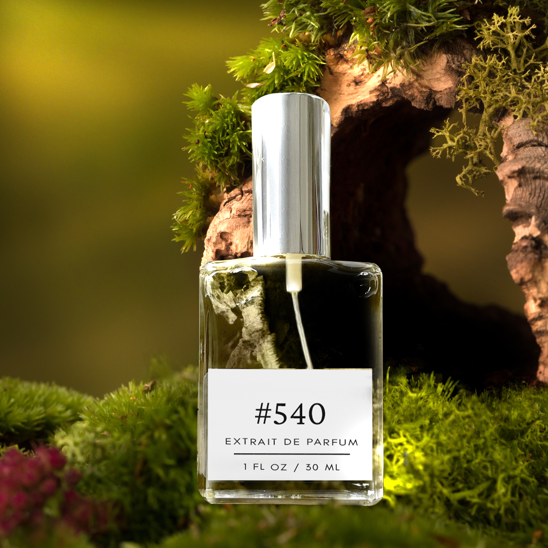 A bottle of Tom Ford fragrance, labeled '540 Dupe,' with a silver cap, stands on a mossy green surface in a dark, natural setting. Sun rays illuminate the bottle from behind, creating a captivating glow. Behind the bottle, a circular wooden structure covered in moss and surrounded by woody elements adds to the rustic charm of the scene.