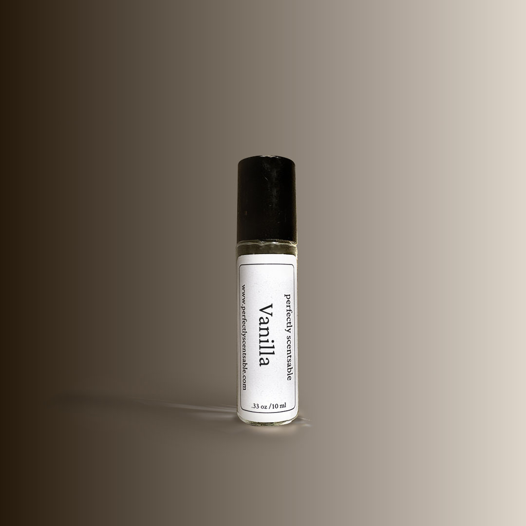 A .33oz rollerbottle labeled Vanilla by Perfectly Scentsable with a dark cap, featuring a .33 oz / 10 ml size label, placed against a smooth brown-to-beige gradient background.