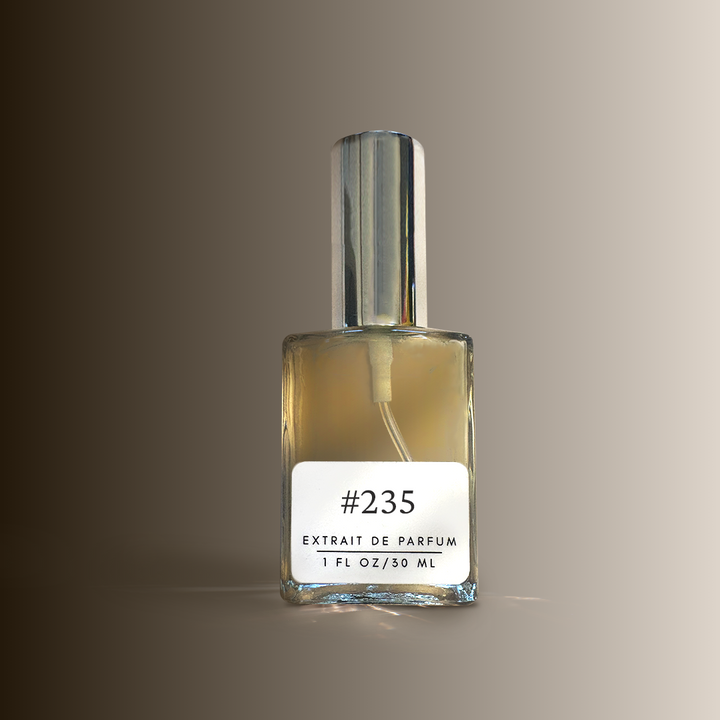 A square glass bottle of Extrait de Parfum #235 with a silver cap.