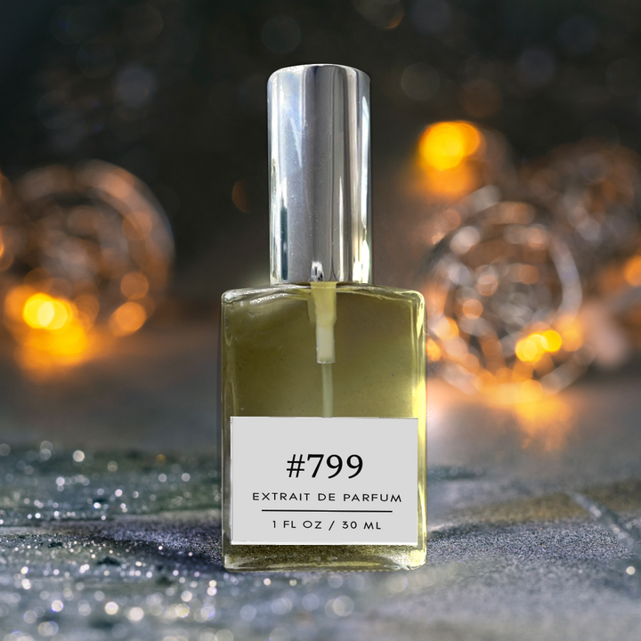 Image of a 30 ml fragrance bottle labeled 'Fragrance 799 Dupe - Al Haramain Amber Oud'. The bottle stands on an amber gray ground, exuding a gender-neutral floral scent.